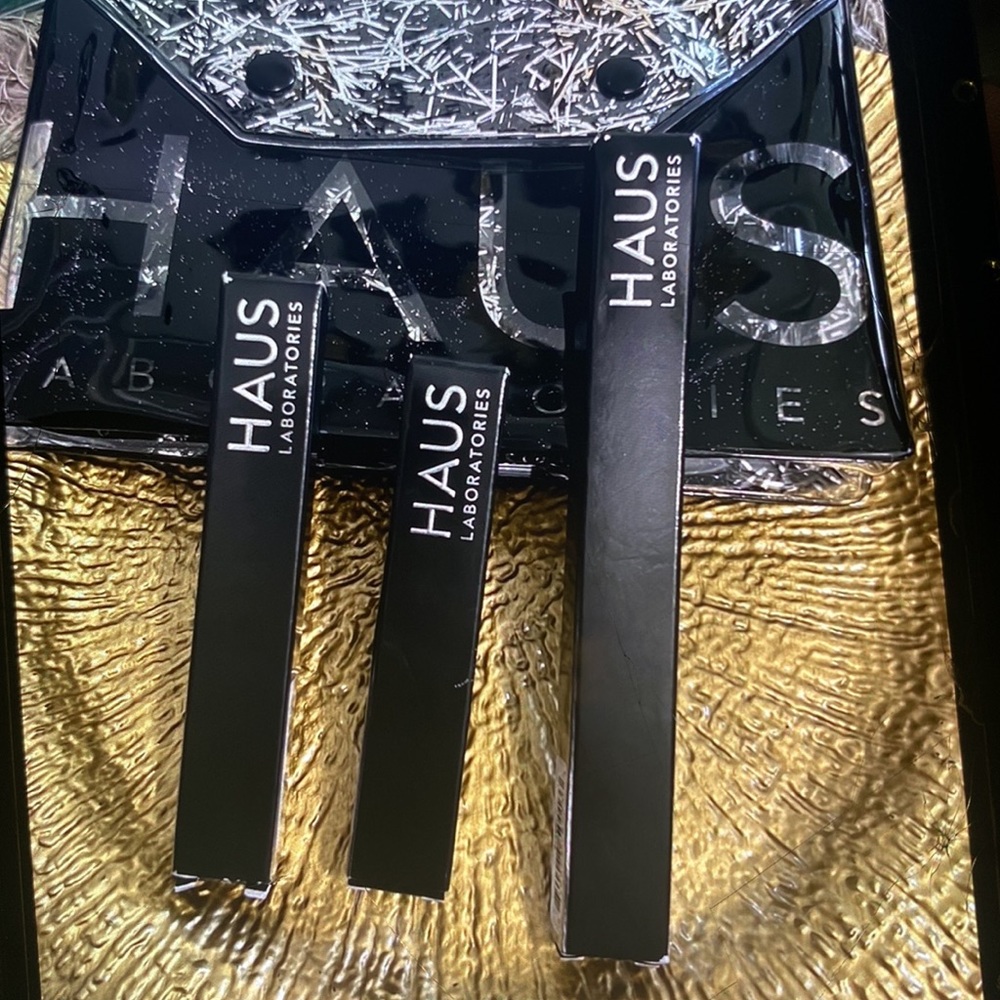 HAUS beauty items with makeup bag